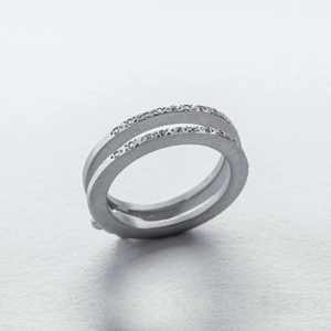 INFINITY FOLDING RING W/ OUTER EDGE WHITE DIAMONDS — PLATINUM