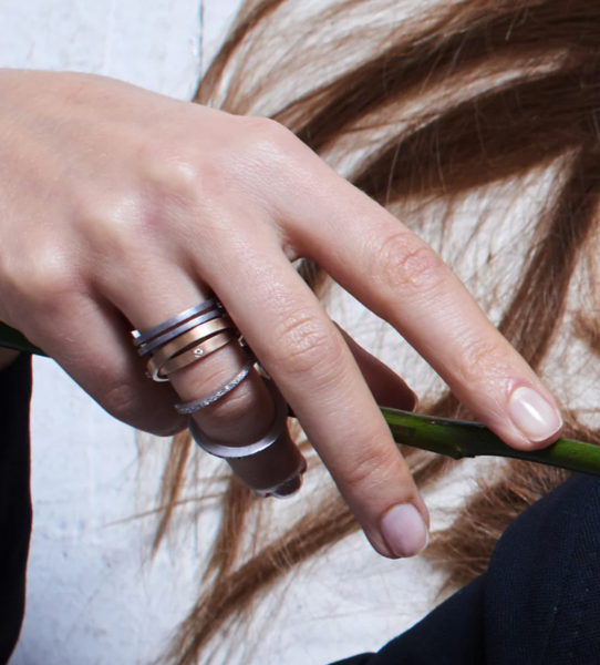 INFINITY FOLDING RING W/ OUTER EDGE WHITE DIAMONDS — PLATINUM